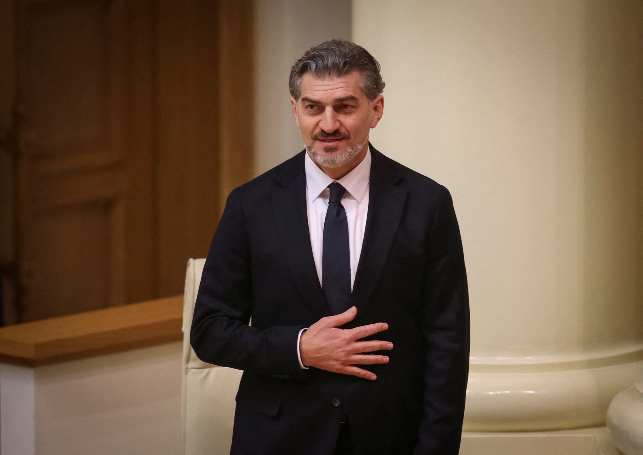 lawmakers elect exfootballer Mikheil Kavelashvili as new